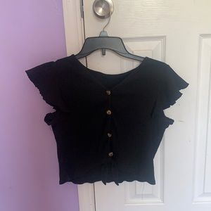 From Shein a cute black crop top.